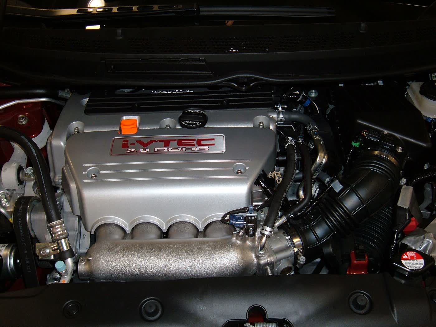 The K20Z3 engine in a Honda Civic Si, bonnet raised at a motor show