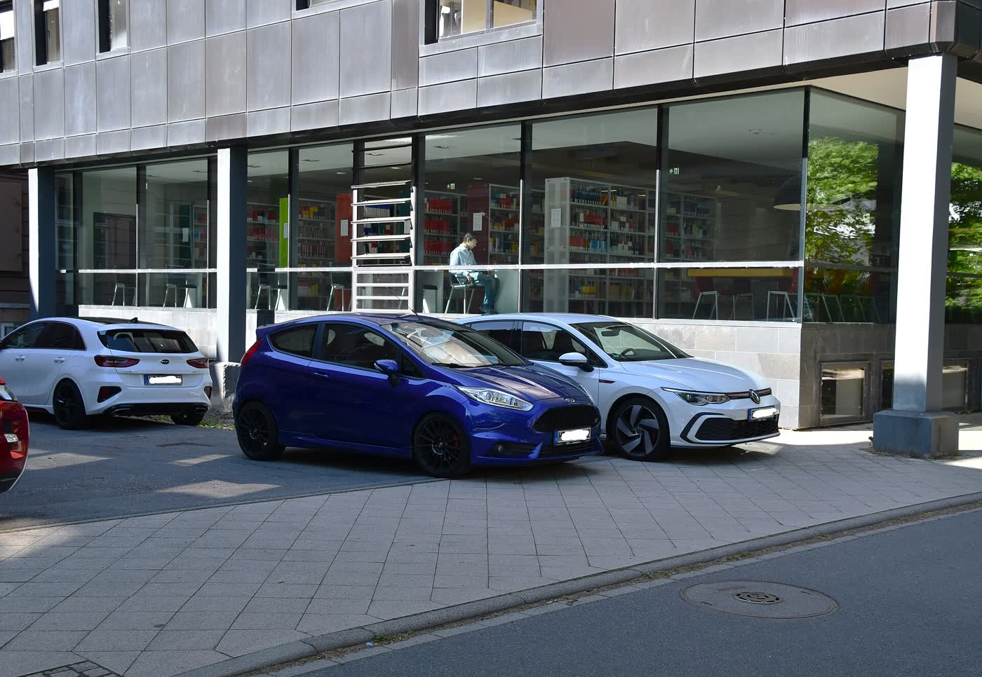 A blue Ford Fiesta ST hatchback, three-quarter view
