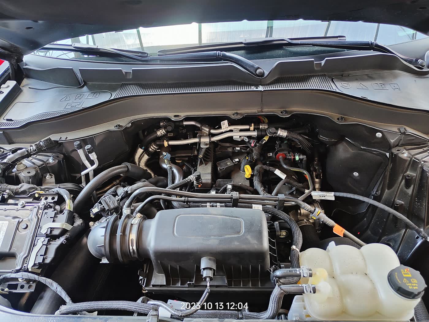 A Ford 2.3 EcoBoost four-cylinder turbo engine on display