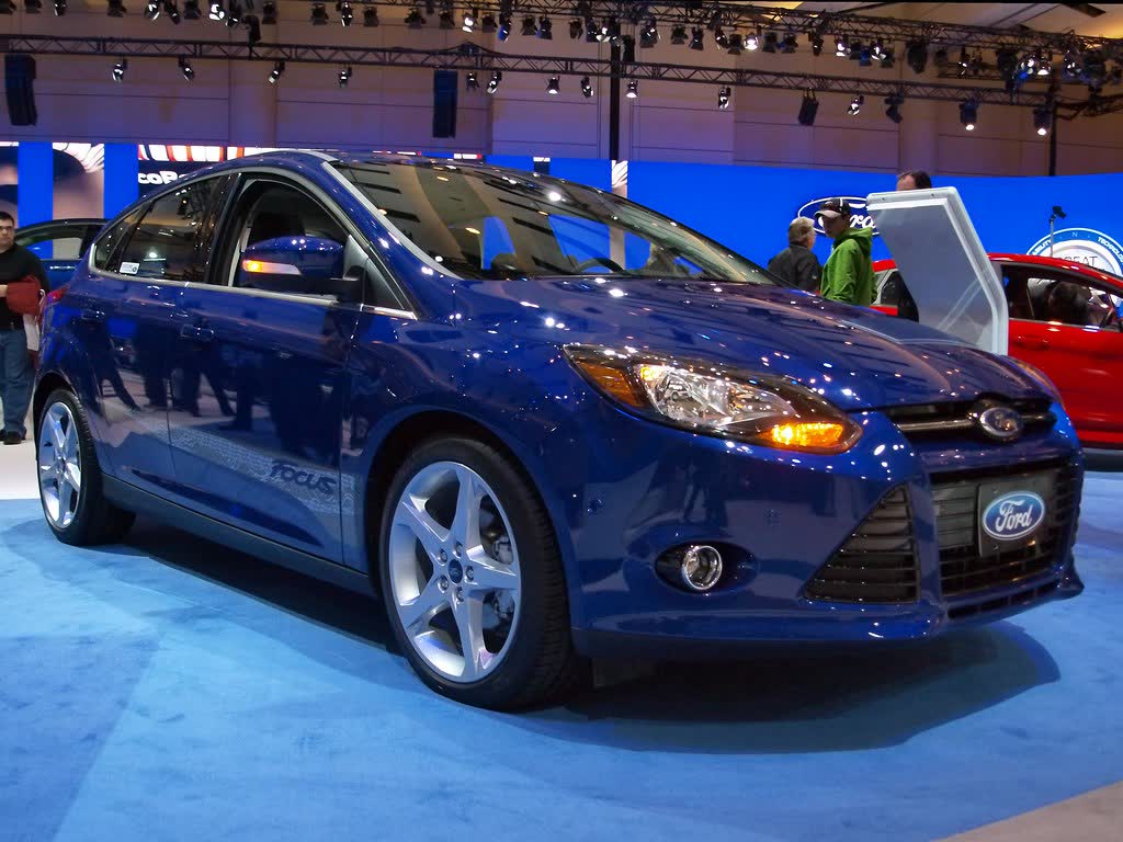 A blue Ford Focus ST on a motor show stand