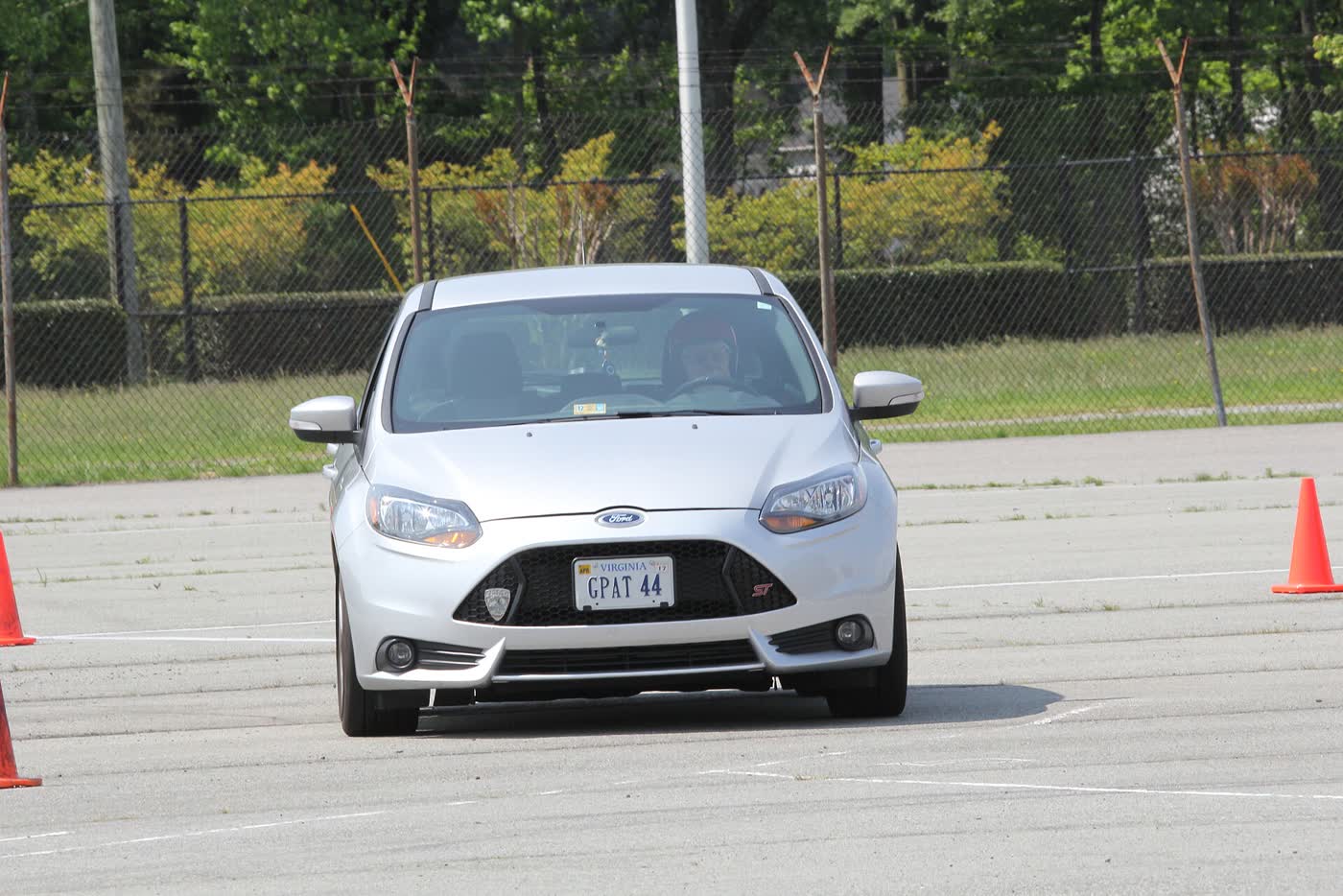 A Ford Focus ST on an autocross course with cones laid out around it