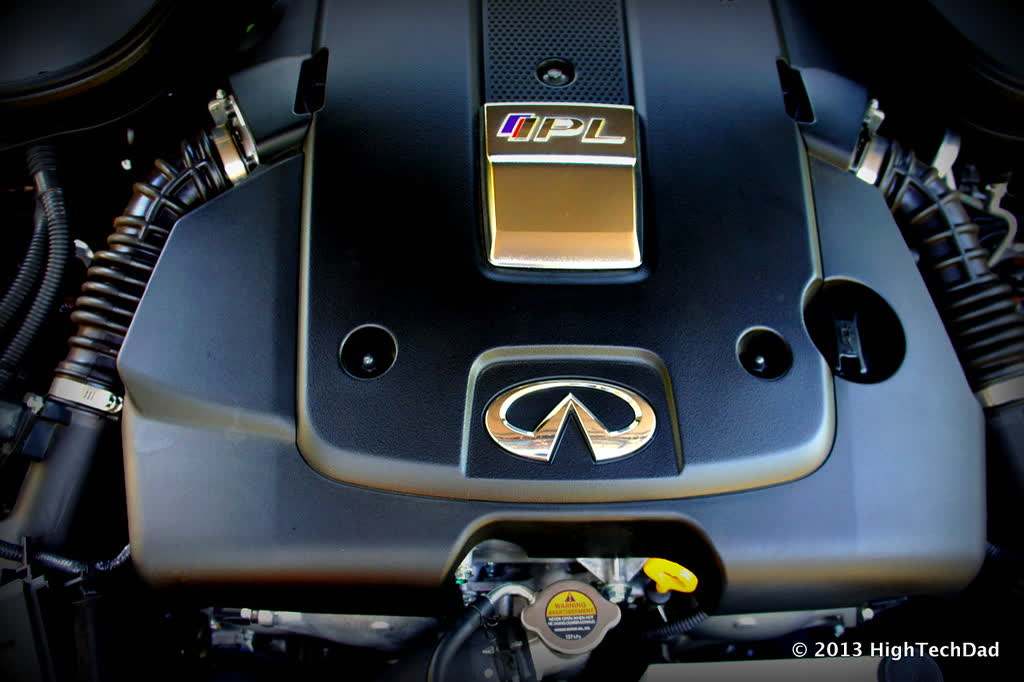 A close-up of the engine cover on an Infiniti VQ37 V6