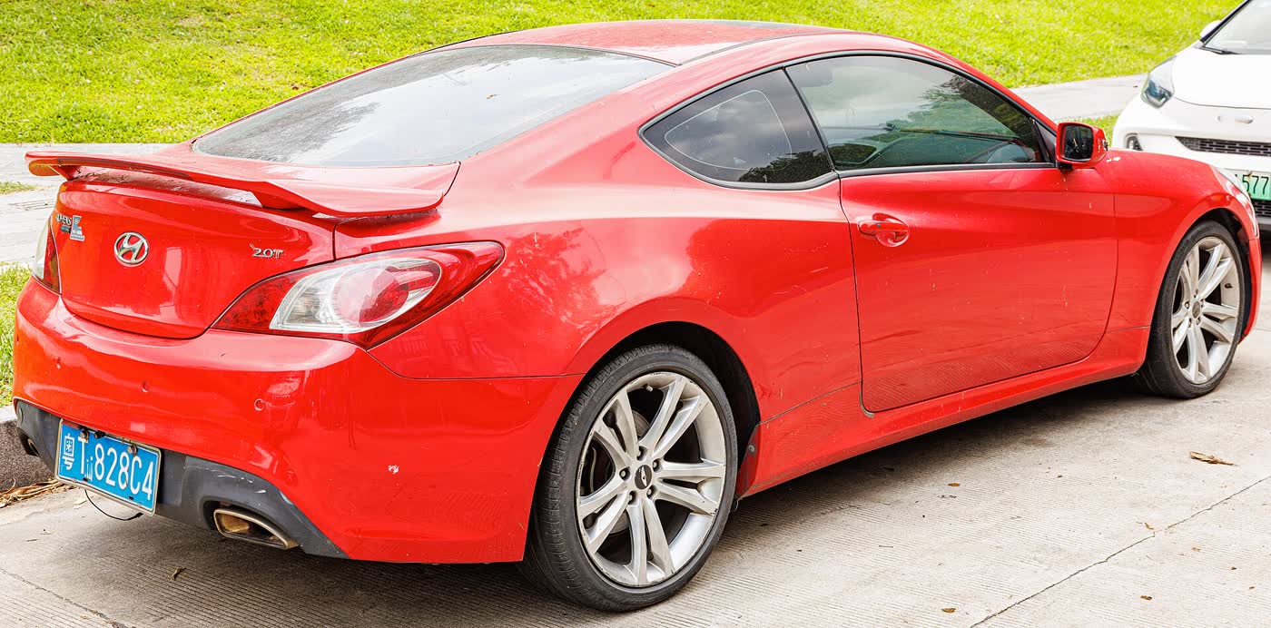 A Hyundai Genesis Coupe parked, three-quarter view