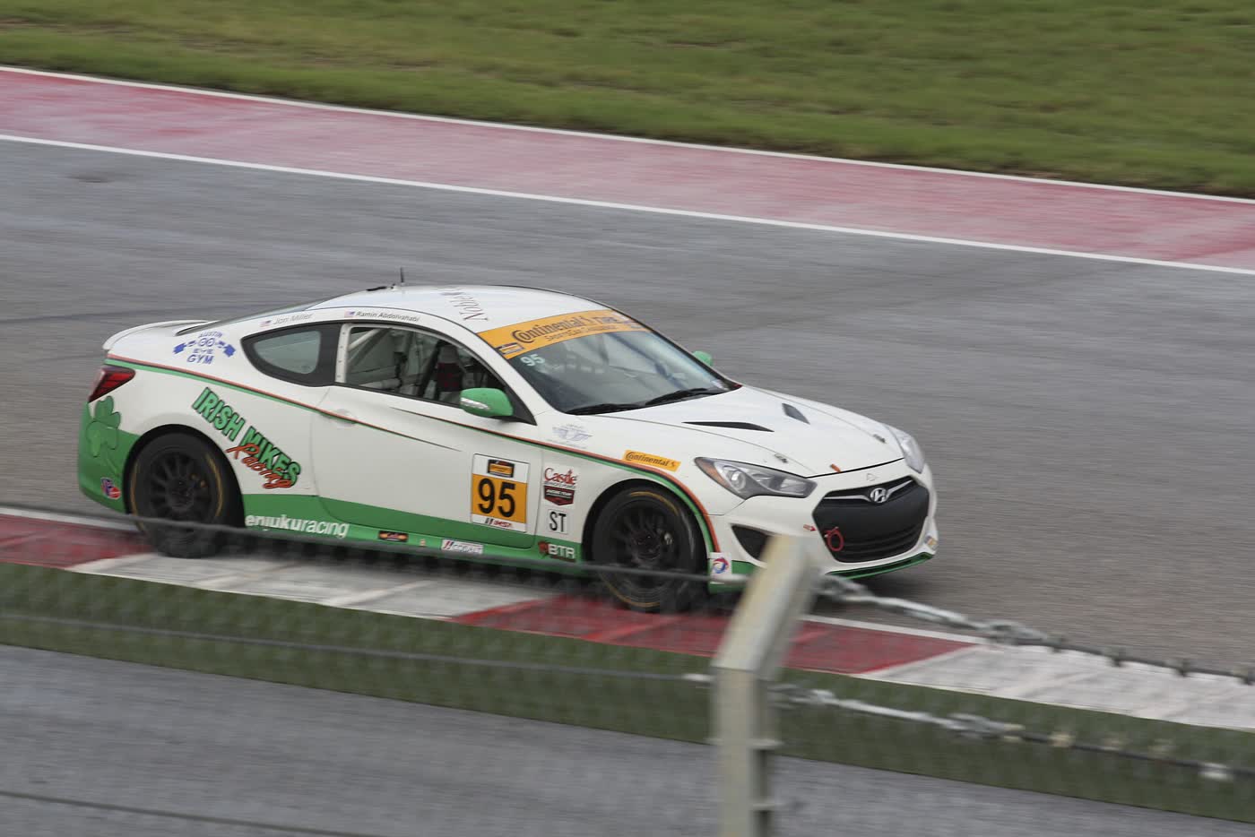 A Hyundai Genesis Coupe race car on circuit at Circuit of the Americas