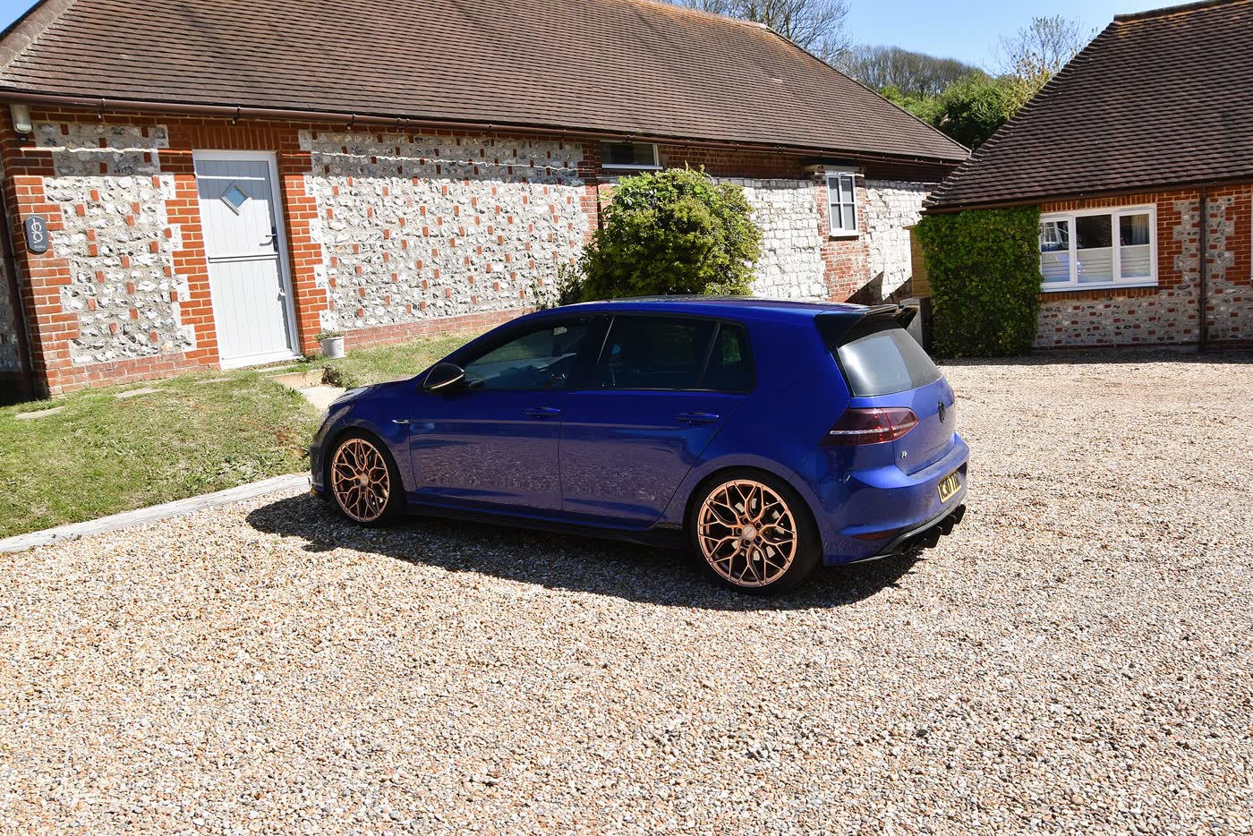 A Volkswagen Golf R Mk7 hatchback, three-quarter view