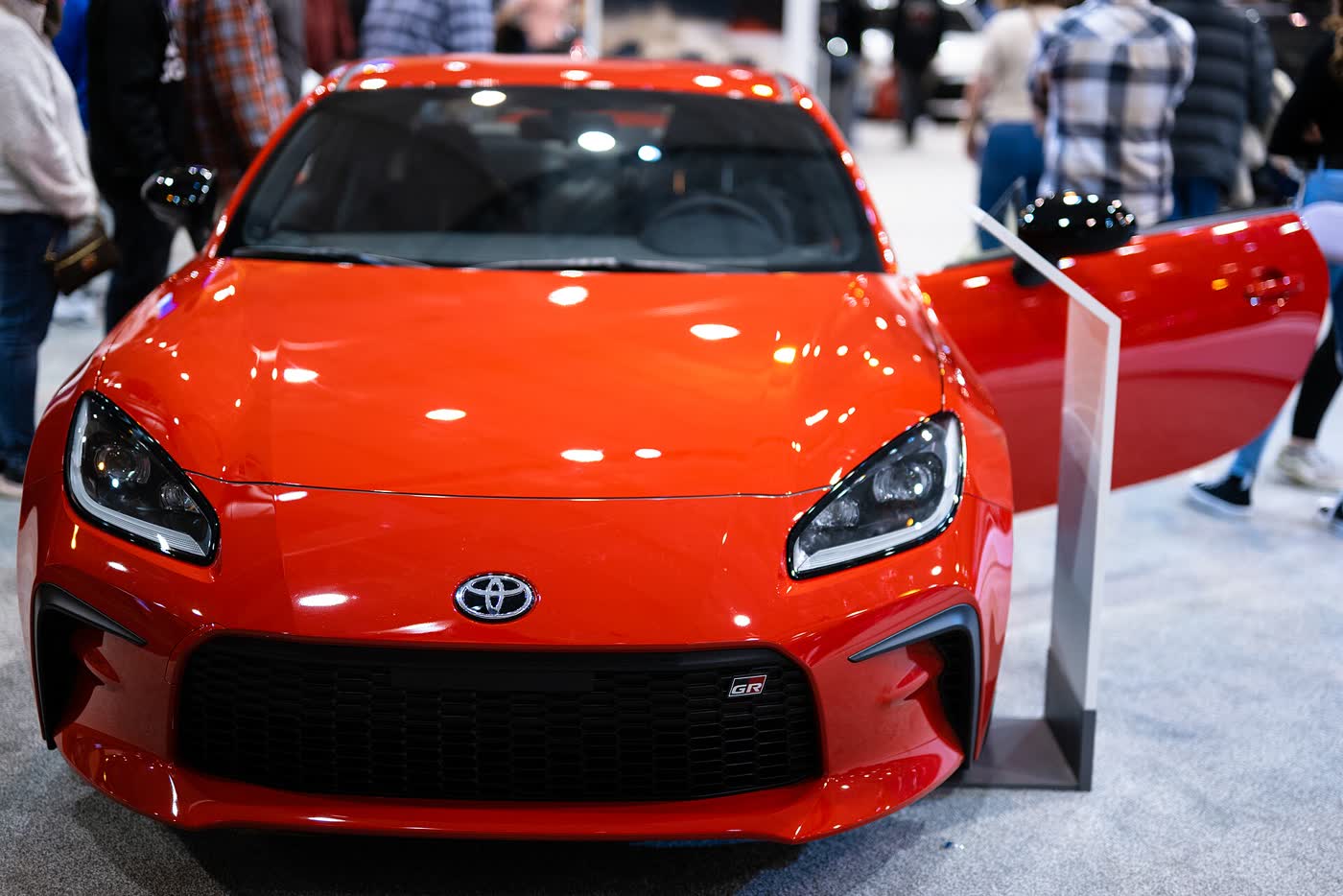 A Toyota GR86 on display at a motor show
