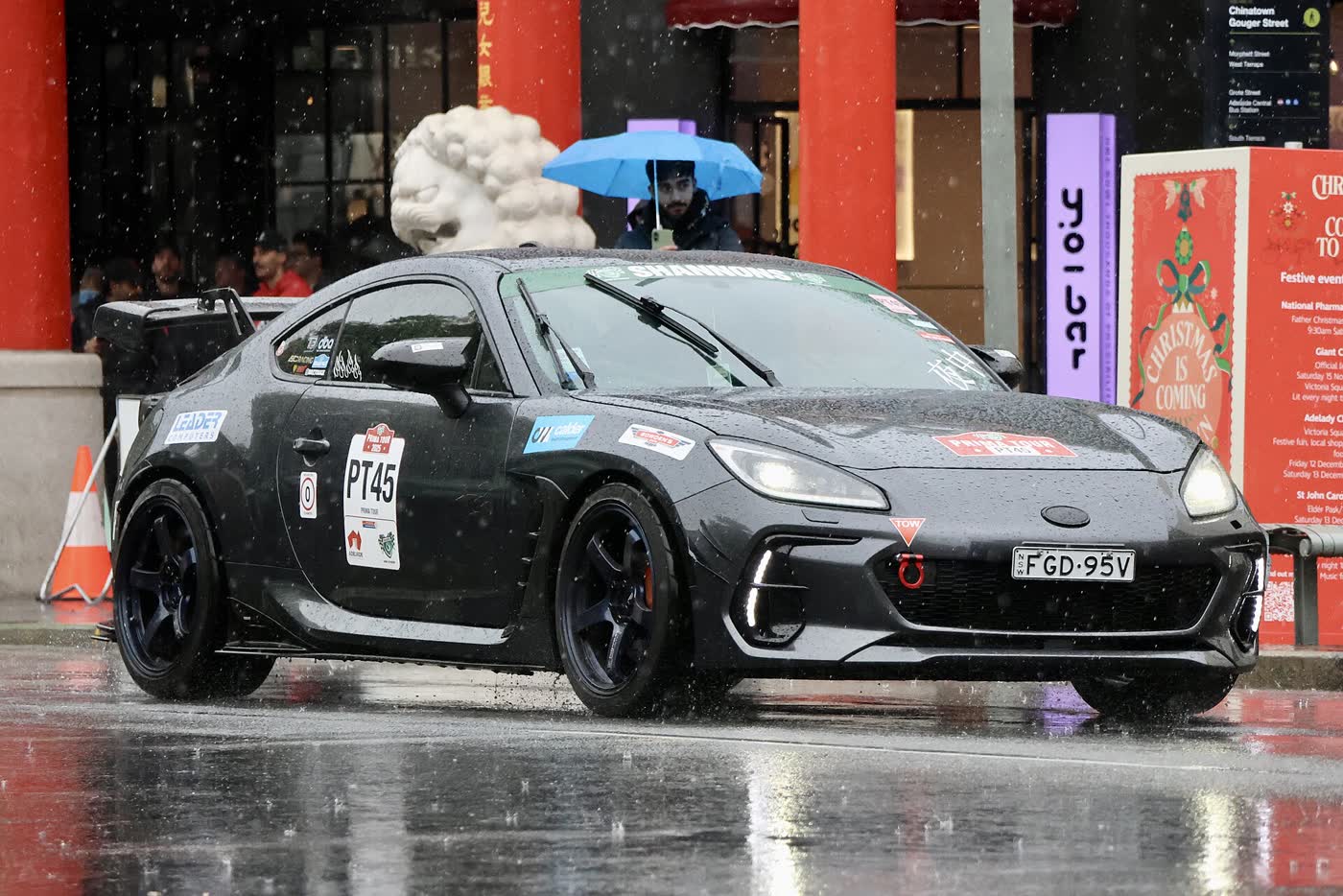 A Toyota GR86 competing on a rally stage