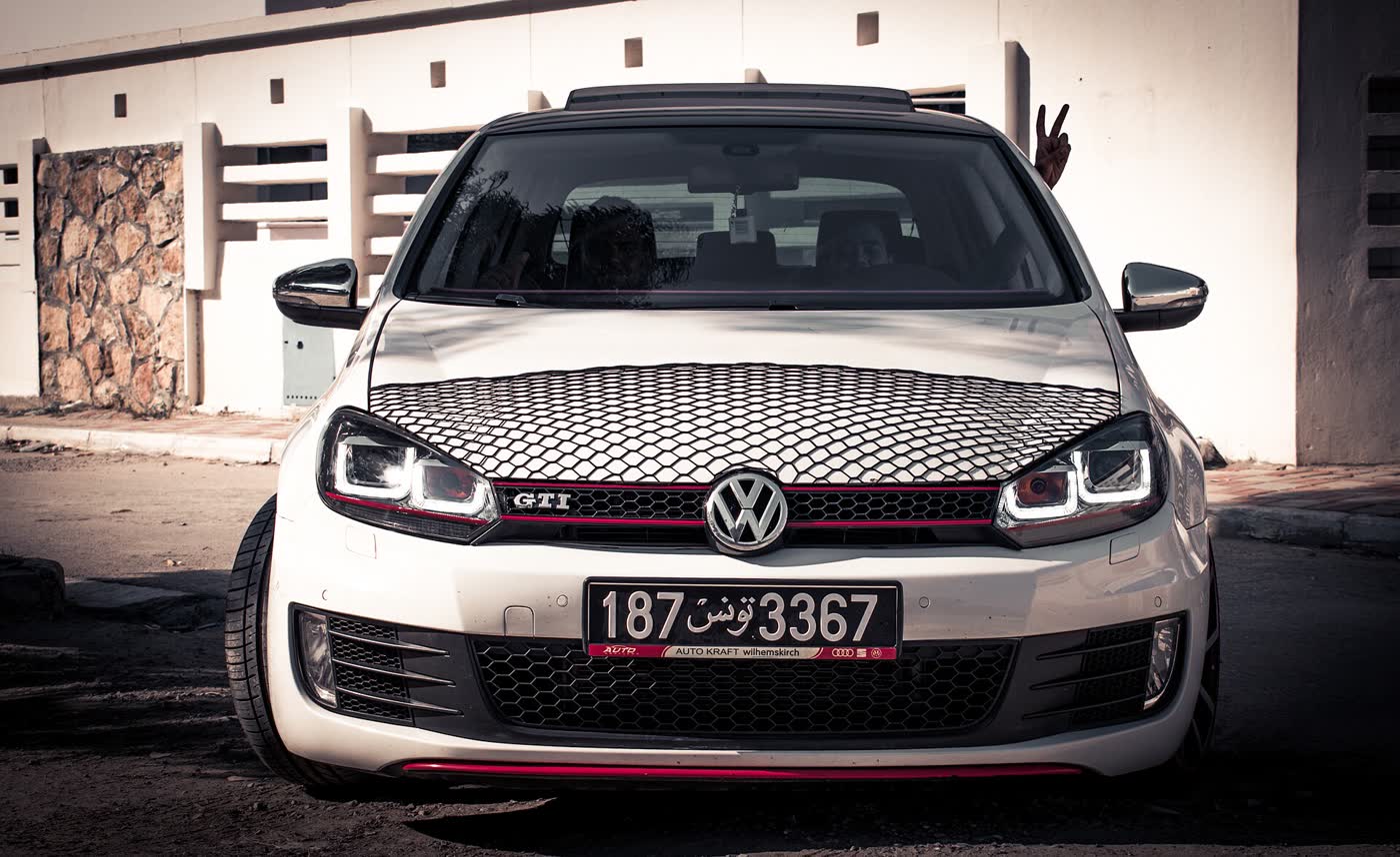 A modified Volkswagen Golf Mk6 with aftermarket wheels