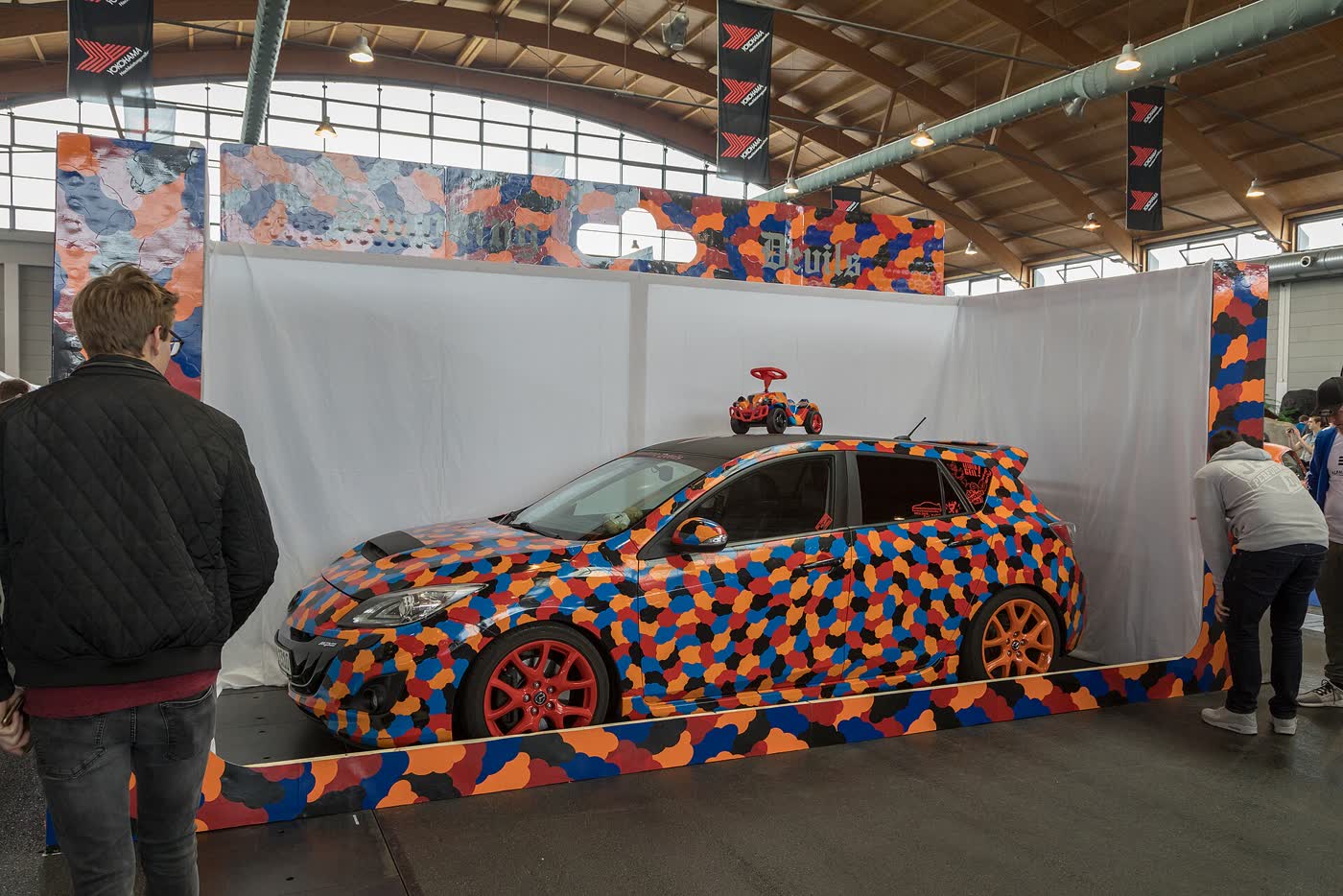 A modified Mazda 3 at a tuning show