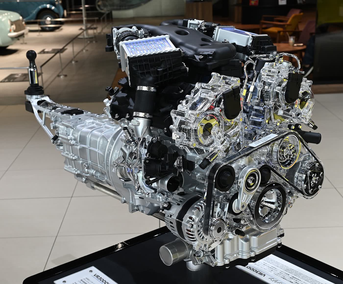 The VR30DDTT engine and manual gearbox from a Nissan Z RZ34, displayed as a powertrain unit