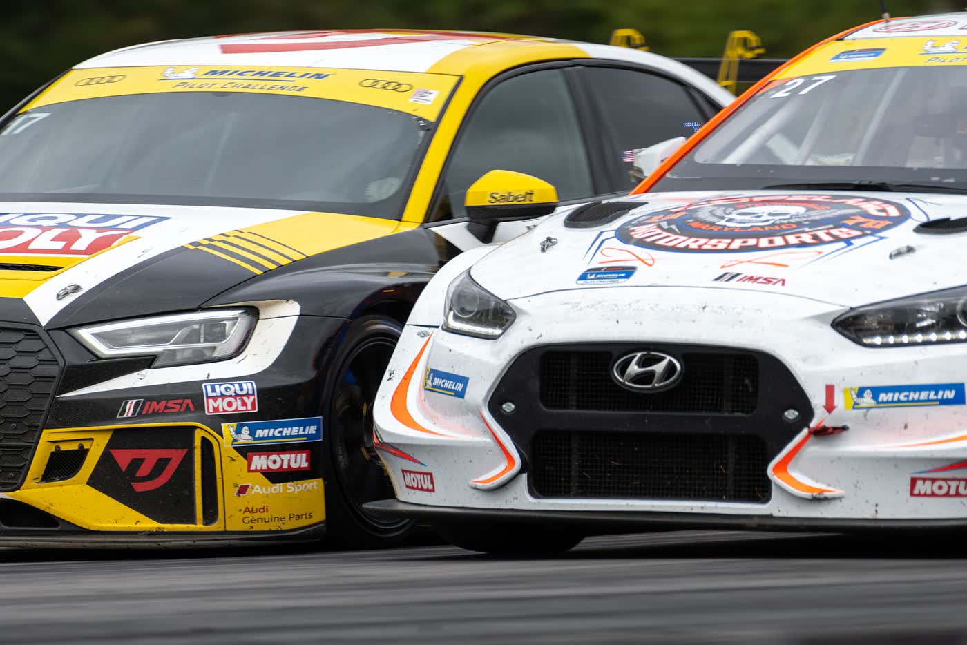 A Hyundai Veloster N TCR race car on circuit